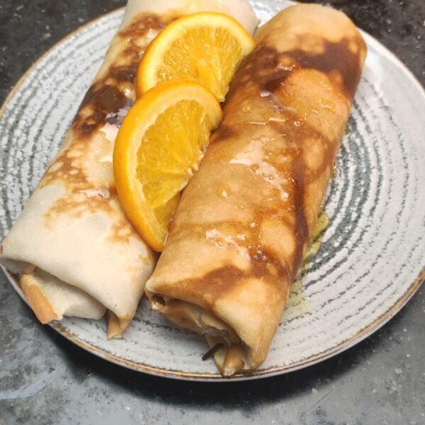 Clătite cu brânză dulce, miere și portocală